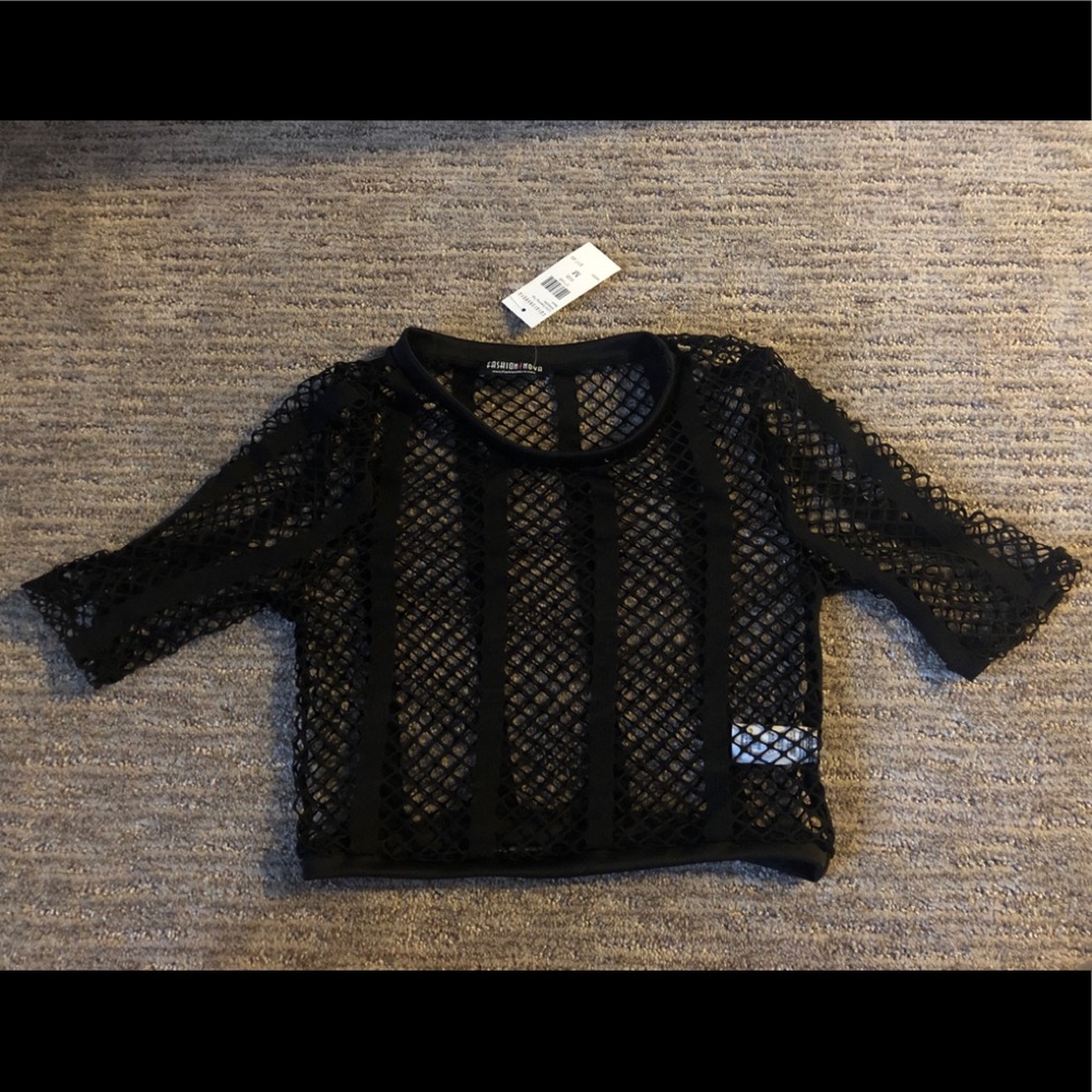 Black love opening top from Fashion Nova.